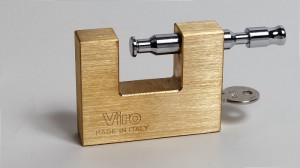 A padlock for shutters by Viro with the positive type opening system, in which the rod is pulled by hand from the same side as the key.