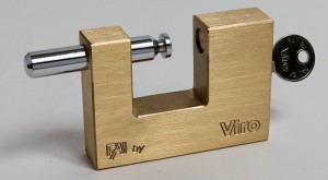  A padlock for shutters with the spring-loaded system, in which the rod is expelled by a spring from the side opposite the key.