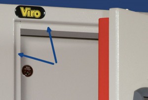 The arrows indicate the attack-proof ledges present on the frame of a Viro cabinet.