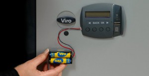 The external battery pack connected to a Viro Ram-Touch cabinet.