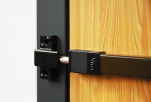 Example of “Universal Bar" mechanical protection system applied to a wooden door.